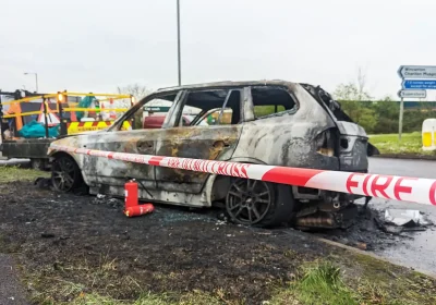 The BMW is left burned out on the roundabout near McDonald's in Wincanton. Picture: New Blackmore Vale