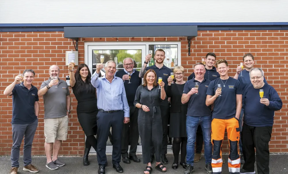 Atlantas Marine team members celebrating outside the company’s Yeovil offices. Picture: Scott Macintyre Photography