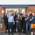 Atlantas Marine team members celebrating outside the company’s Yeovil offices. Picture: Scott Macintyre Photography