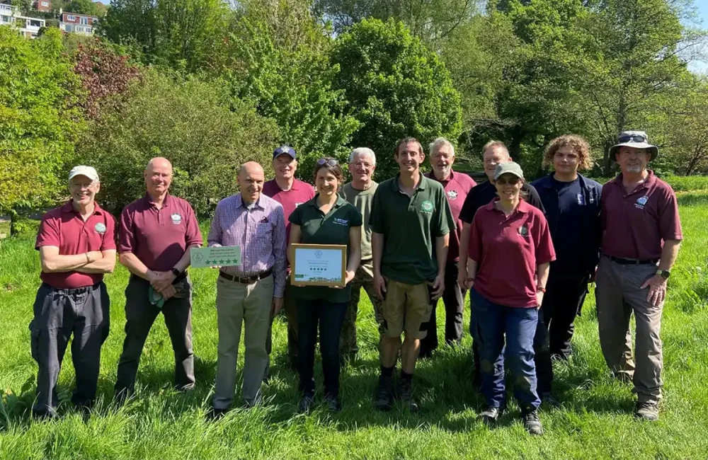 Friends of Yeovil Country Park volunteers with Countryside Rangers and the RHS Pride in Parks Award. Picture: Somerset Council