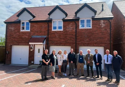Nick Draper, Claire Tough, Ella Matthews, Sian Griffin and Mark Woodward, from Homes in Sedgemoor, with Somerset Councillors Bill Revans and Alan Bradford, with MD Ed Khodabandehloo, site manager Clive Linham and divisional director commercial Nick Birch, from Summerfield Homes