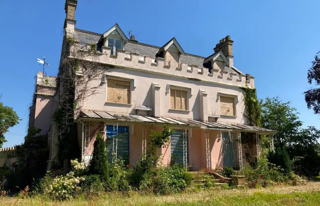 The formerly impressive Woodlands Castle is now a dilapidated building... Picture: Prime Meridian/Somerset Council