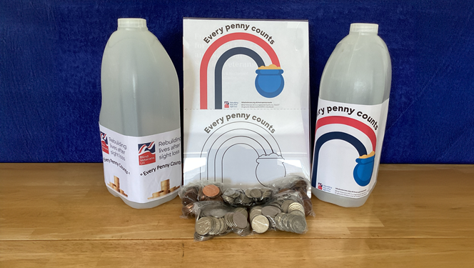 John's milk cartons with labels and the money he's raised so far Picture: Blind Veterans UK
