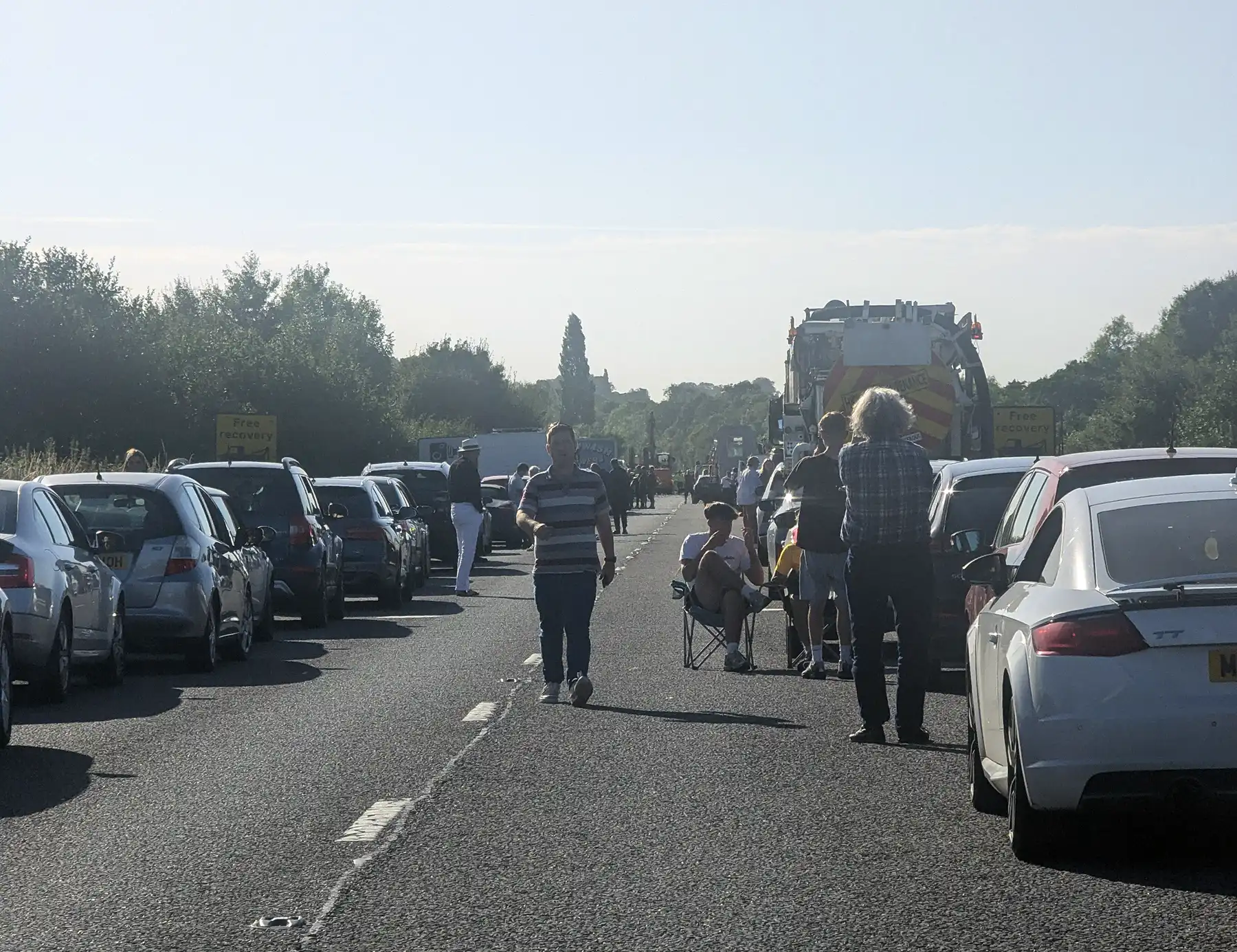 Some travellers brought out chairs on the closed carriageway