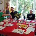 Dan Aldridge with residents and staff during his visit to Abbeyfield House