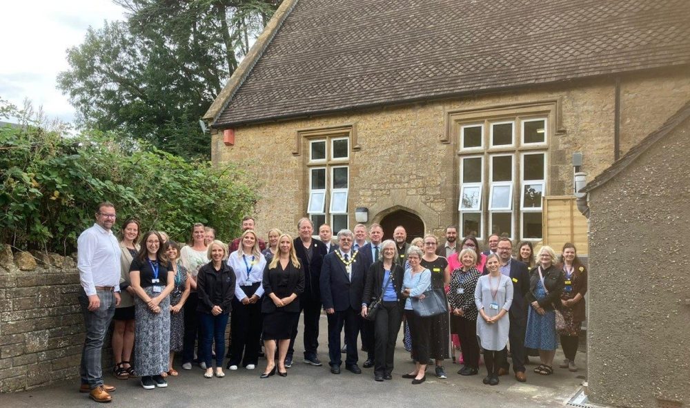 Chair of Somerset Council, cllr Mike Best, and lead executive member for children, families and education, cllr Heather Shearer, with partners and guests at the opening of Misterton therapeutic education provision Picture: Somerset Council
