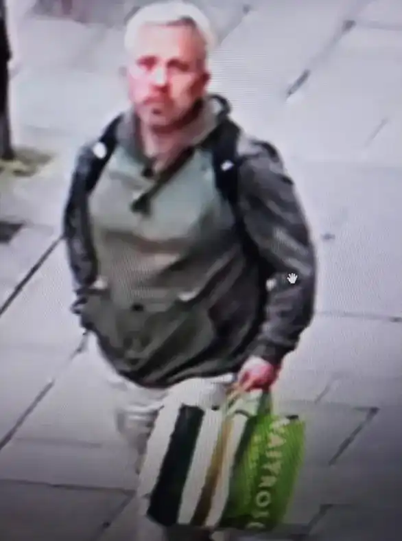 Officers in Bath want to trace this person after thefts from a charity shop. Picture: Avon & Somerset Police