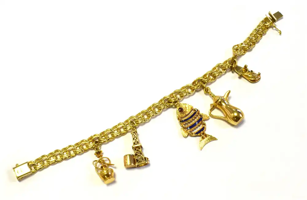 An 18ct gold charm bracelet sold for £1,150. Picture: GTH