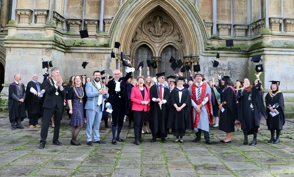 Strode College graduates with dignitaries at Wells Cathedral
