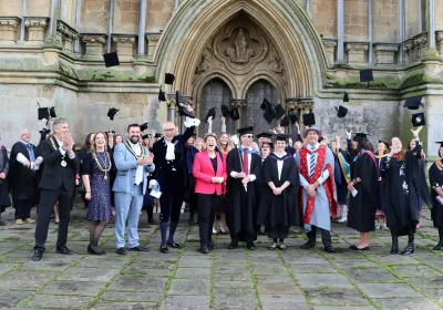Strode College graduates with dignitaries at Wells Cathedral