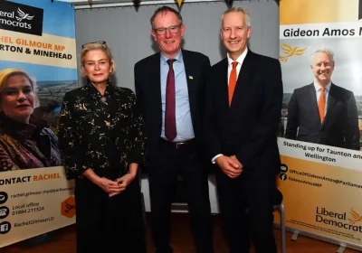 MPs Rachel Gilmour (Tiverton and Minehead), left, and Gideon Amos (Taunton & Wellington), right, with Lord Teverson