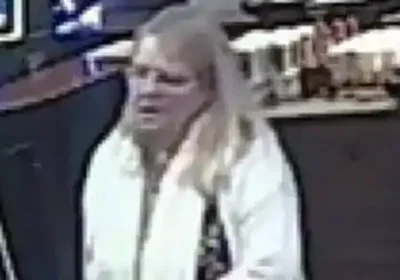 Officers are keen to trace this woman, pictured at the Perkin Warbeck in Taunton. Picture: Avon & Somerset Police