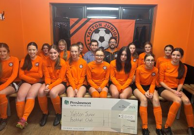 The team being presented with the cheque Picture: Persimmon Homes