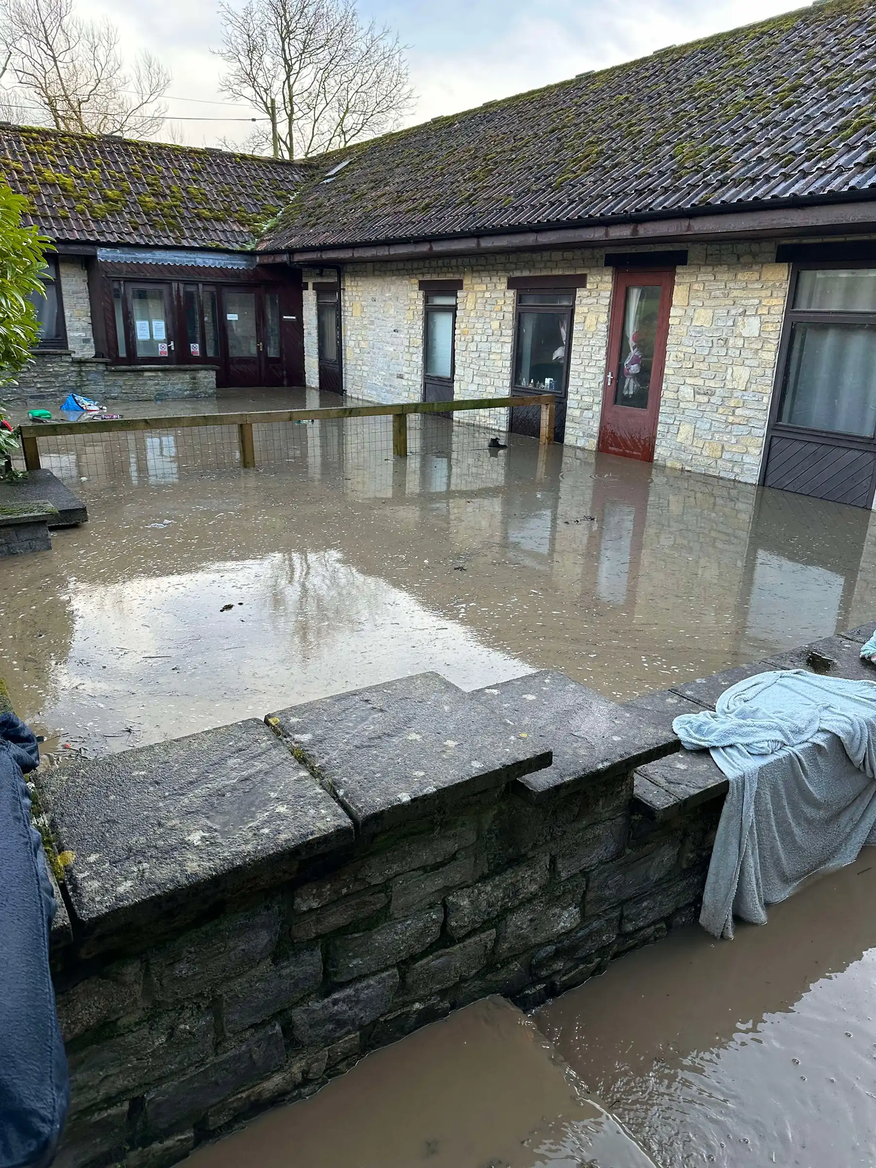 The grooms' accommodation at the farm, near Somerton, was badly flooded