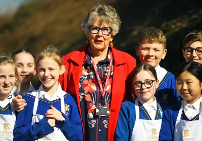 Dame Prue Leith DBE with Queen's College pupils