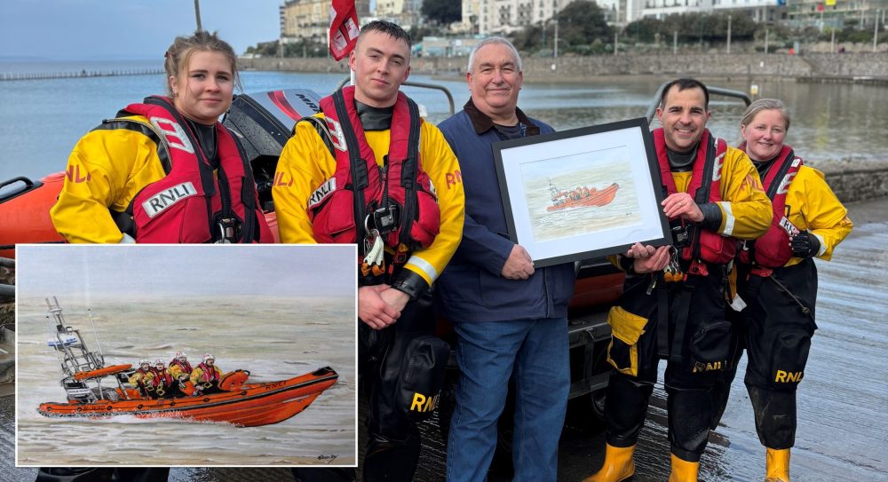 Malcom handing over his painting to Weston-super-Mare RNLI crew Picture: RNLI/Holly Turner
