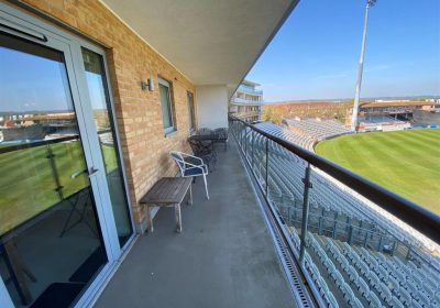 The apartment boasts a private balcony with views of the County Ground in Taunton