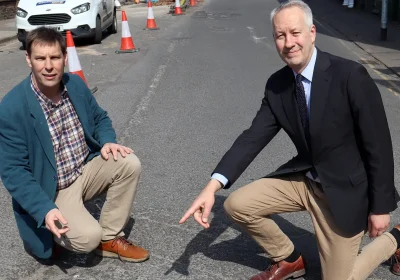 Cllr Wilkins and MP Gideon Amos pointing out potholes...