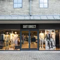 Suit Direct has moved premises at Clarks Village in Street