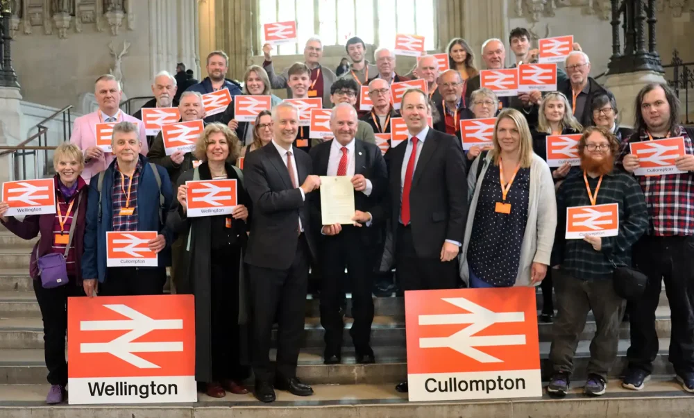 Wellington rail campaigners with Lord Hendy and MPs Gideon Amos and Richard Foord