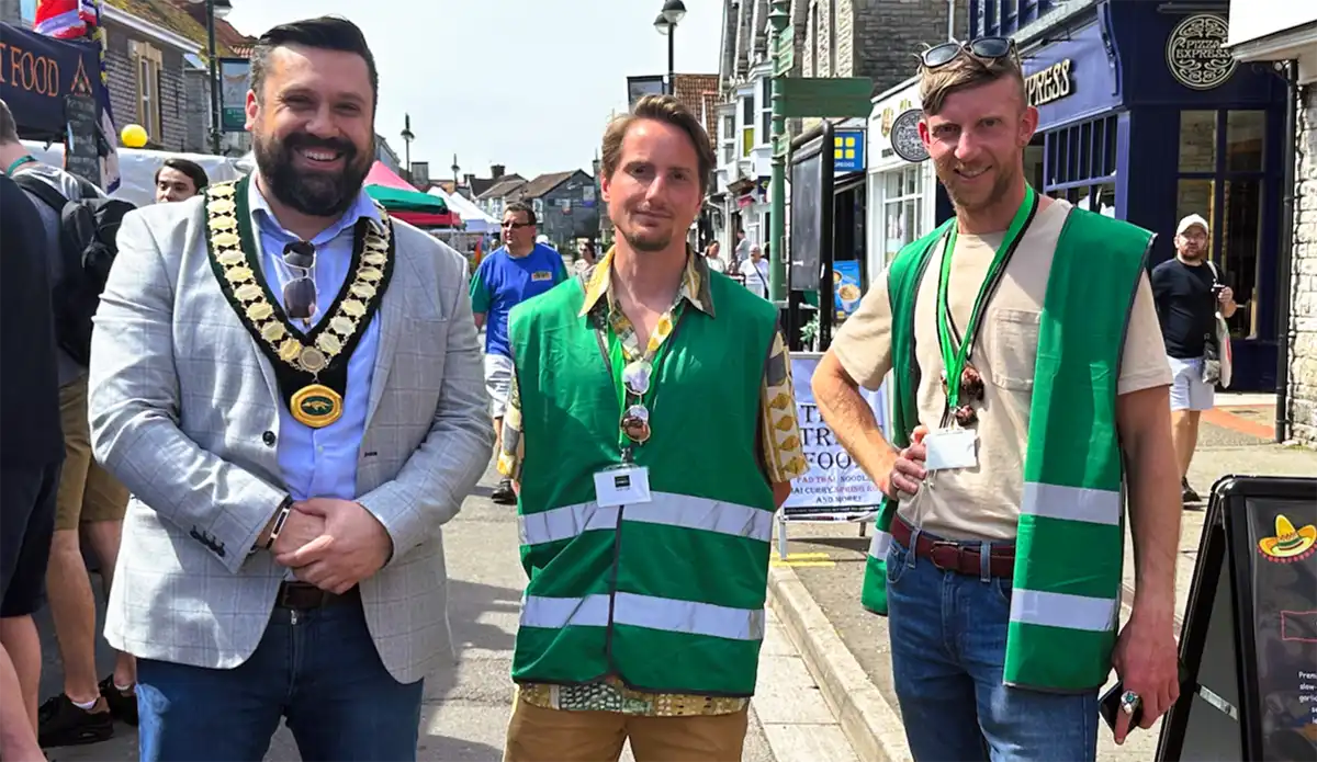 Chair of Street Parish Council, Bryan Knickerbocker, with market officers Matt Whiting and Craig Jackson