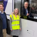 Gideon Amos on board one of Somerset's new electric buses in March, with Cllr Richard Wilkins and Ellie Irwin, of First Bus South