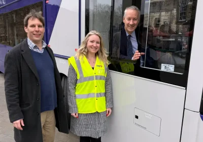 Gideon Amos on board one of Somerset's new electric buses in March, with Cllr Richard Wilkins and Ellie Irwin, of First Bus South
