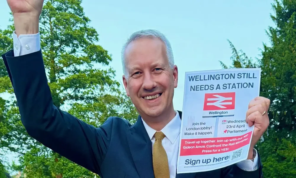 Taunton & Wellington MP Gideon Amos celebrates the station news