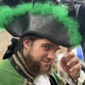 Glastonbury town crier Brad Crowley sporting his new hat - created by TribaMythica. Picture: TribaMythica