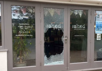 A door at The Shed, in Goodland Gardens, Taunton, was smashed during the raid. Picture: Facebook