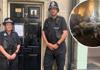 Officers outside the flat - which has been shut down for three months - in Bath. Picture: Avon & Somerset Police