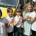 Vallis First School pupils enjoying a celebratory ice cream