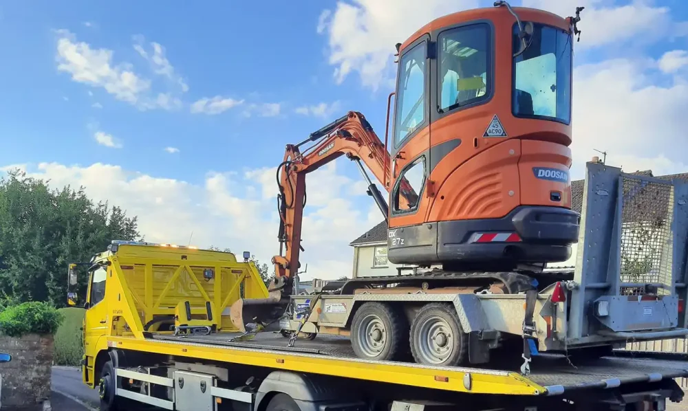A suspected stolen digger was found - along with the trailer. Picture: Avon & Somerset Police