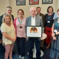 Louise's husband, Jim Binning, was at the official naming of the new room at Yeovil Library. Picture: Somerset Council