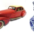The Mercedes 540K toy sold for £1,200, while the CHinese vase went for £20,000. Pictures: GTH