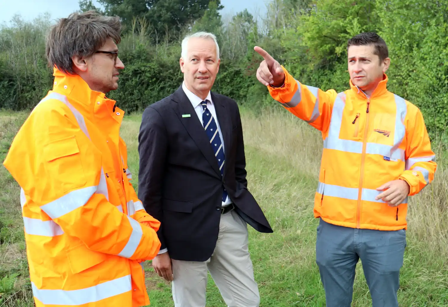 Taunton & Wellington MP Gideon Amos, centre, during a visit to the station site with Network Rail officials