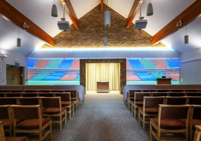A digital wall in the chapel can display personalised backdrops