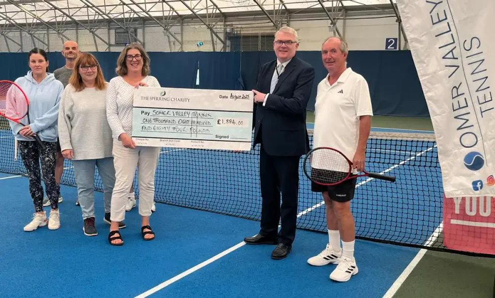 George Persson, trustee of The Ralph and Irma Sperring Charity, with Jenny Perez (Chair), Jenny Barton (Co-ordinator), Martin Carruthers (Treasurer), and attendees of the Rusty Racketeers Club