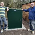 A new steel shed helps Friends of Berrow Beach store their battery-powered trolley