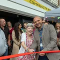 Alliance Homes chief operating officer, Iain Lock, cuts the ribbon at the Coronation Community Hub in Weston with resident, Jayne Williams