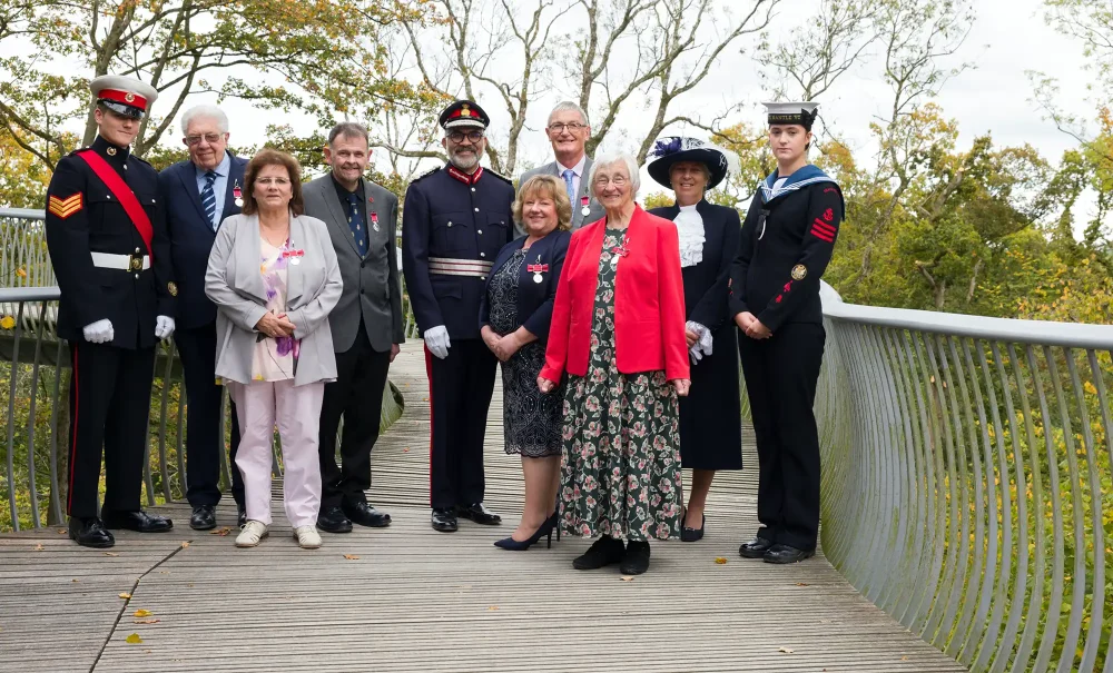 From left; Lieutenancy Cadet Sergeant George Monk, Keith Taylor, Julie Matthews, Paul Bunce, Lord-Lieutenant Mohammed Saddiq, Julia Knight, Dr Harvey Sampson, Nola French, High Sheriff Janet Montgomery and Lieutenancy Leading Cadet Natalie Wilson