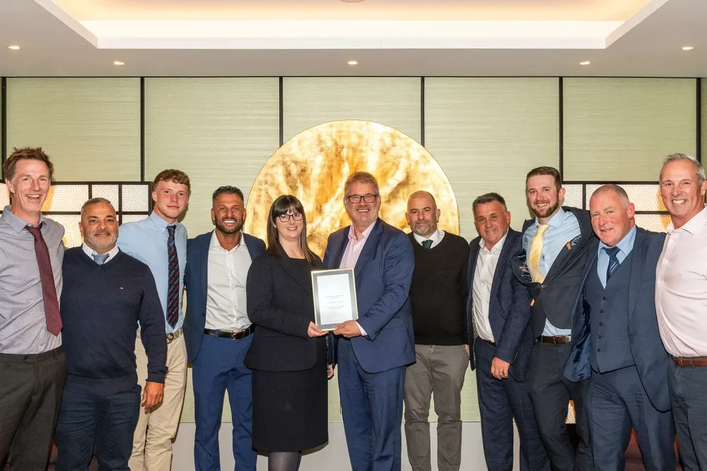 The team celebrating after receiving the commendation