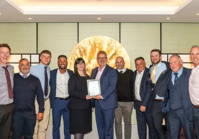 The team celebrating after receiving the commendation