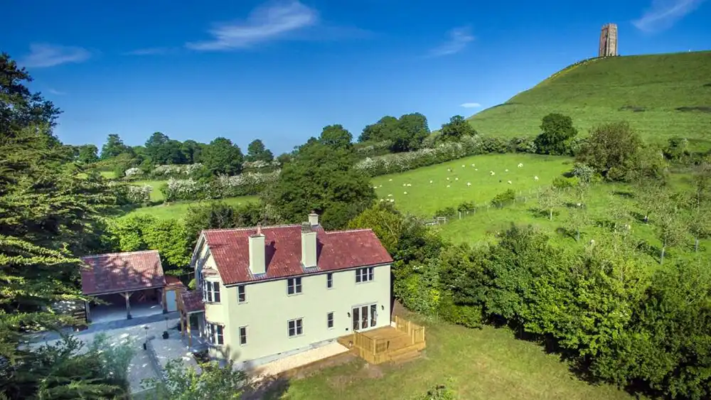 The house sits at the foot of Glastonbury Tor
