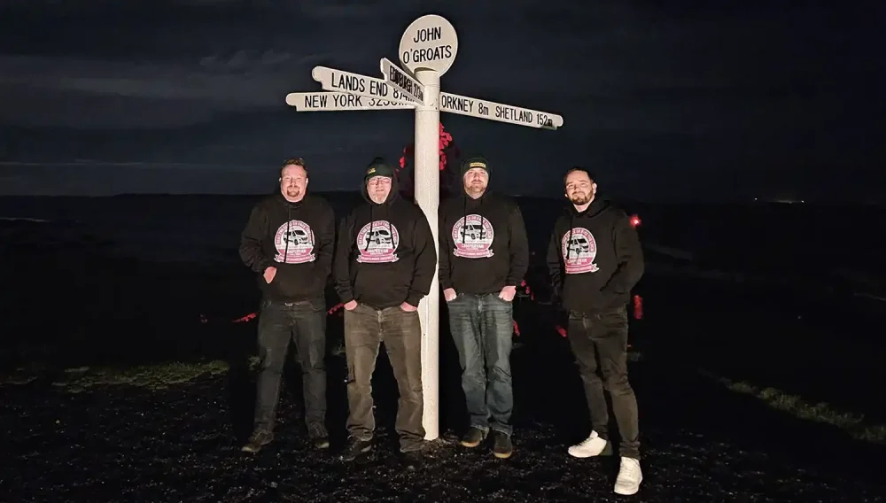 The team from Highbridge Caravans at John O'Groats