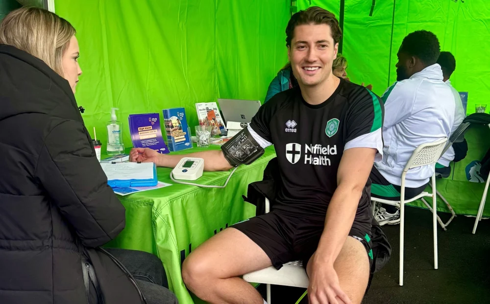 Yeovil star Brett McGavin has his blood pressure checked at Huish Park. Picture: Somerset Council