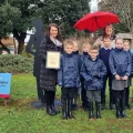 Youngsters from Knights Templar school donning their donated waterproofs and wellies. Picture: Somerset Council