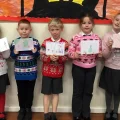Pupils with the cards they designed for older residents in Wincanton