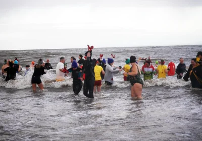 More than 100 swimmers took to the waters off Minehead Beach in aid of St Margaret's Hospice