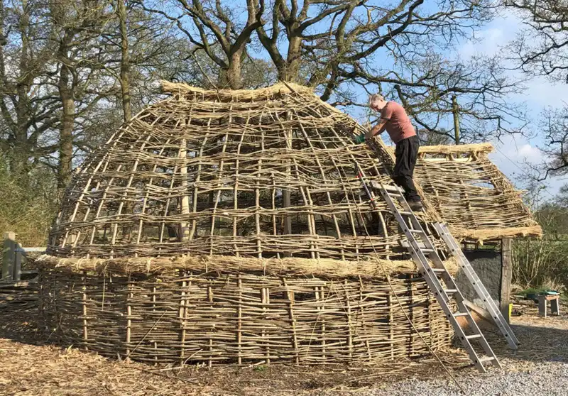 The structure of the Iron Age Roundhouse at Avalon Archaeology is described as an 'upside down basket'